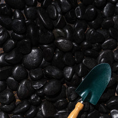 Black pebbles for plants from Plant House, 20kg bag, smooth dark stones ideal for decorative garden or indoor plant arrangements.