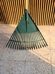 Garden rake by Plant House with sturdy metal tines for gardening and planting tasks, ideal for soil and leaf cleanup.