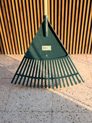Plant House garden rake for planting, with metal tines and wooden handle, suitable for garden soil and plant bed preparation.
