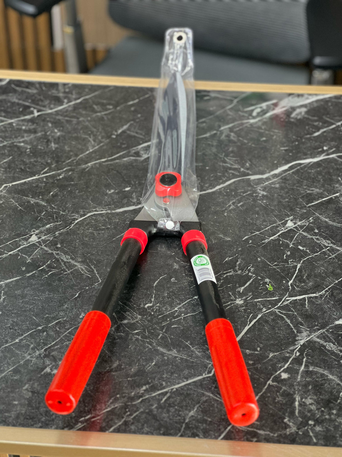 Heavy-duty garden pruning shears from Plant House made of high carbon steel, designed for trimming and cutting plants and branches.